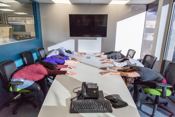  Want Happier, Healthier, More Engaged Employees? Add Chair Yoga to Your Benefits Package.